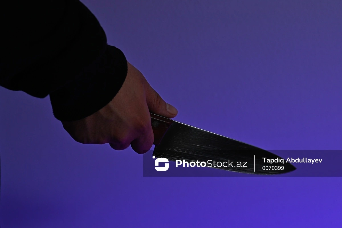 Tanıdığı qadının evinə girib ərini bıçaqladı